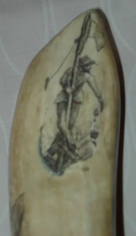 Ivory scrimshaw whale tooth 4 in.
